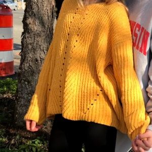 yellow sweater